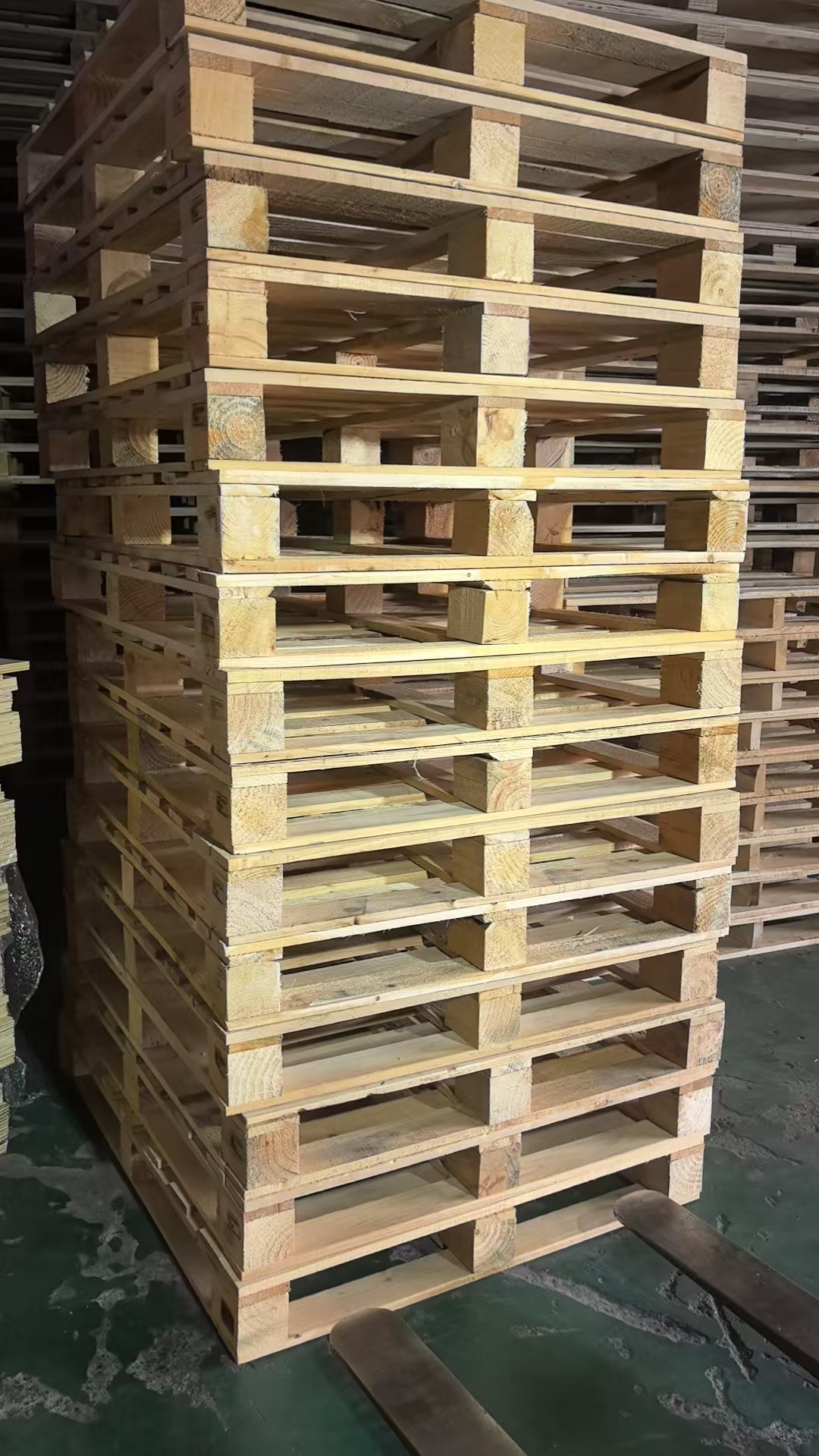 H-Frame Pallets Stacked in Warehouse